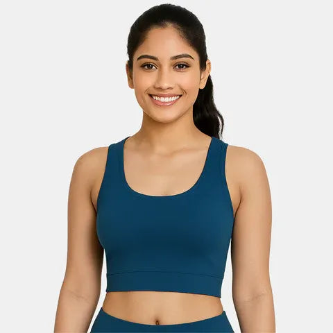 Women’s non-wired padded sports bra in majolica blue shade with soft coverage, removable pads and active support from Envie