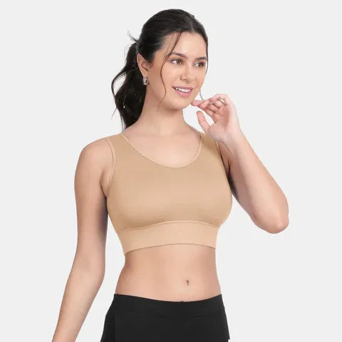 Envie NVB1127 women’s nude sports bra with smooth padded cups and customizable removable padding