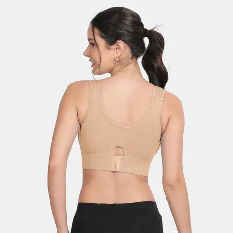 Envie NVB1127 women’s nude sports bra with smooth padded cups and customizable removable padding