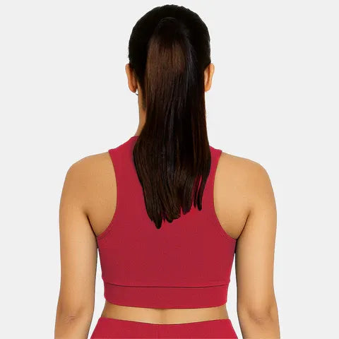 Red padded sports bra with moisture-wicking fabric and comfortable support