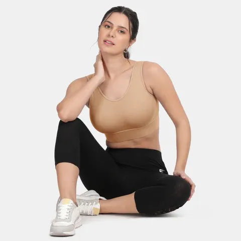 Envie NVB1127 women’s nude sports bra with smooth padded cups and customizable removable padding