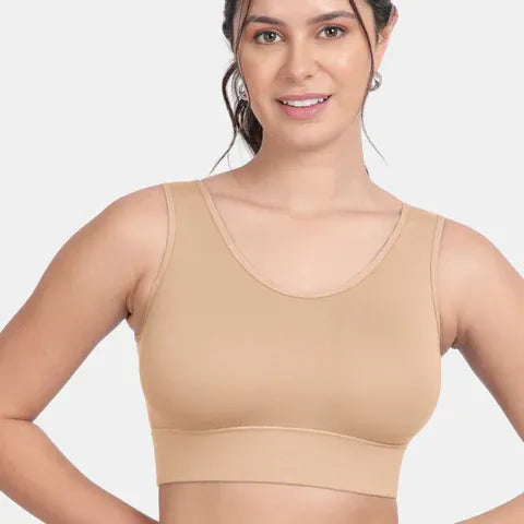 Envie NVB1127 women’s nude sports bra with smooth padded cups and customizable removable padding